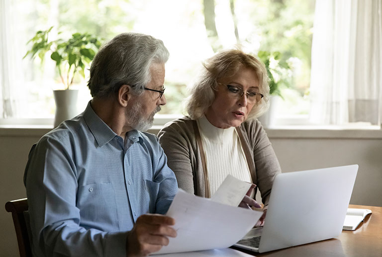 Senior Couple Doing Paperwork