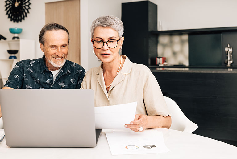 Senior Couple Looking Over Paperwork